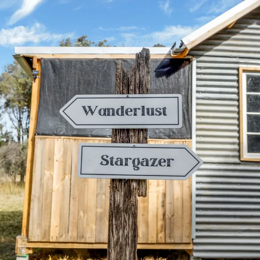 Interior and grounds at the Stargazer glamping tent, Eagle Point Cottages