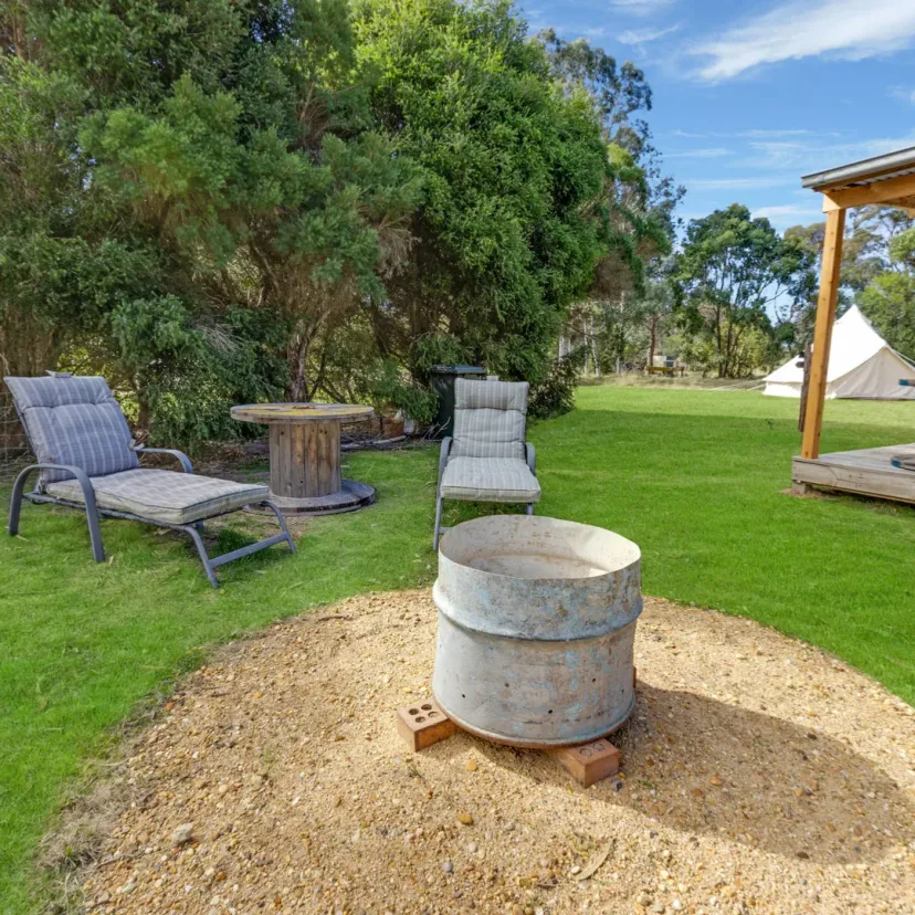 Interior and grounds at the Stargazer glamping tent, Eagle Point Cottages