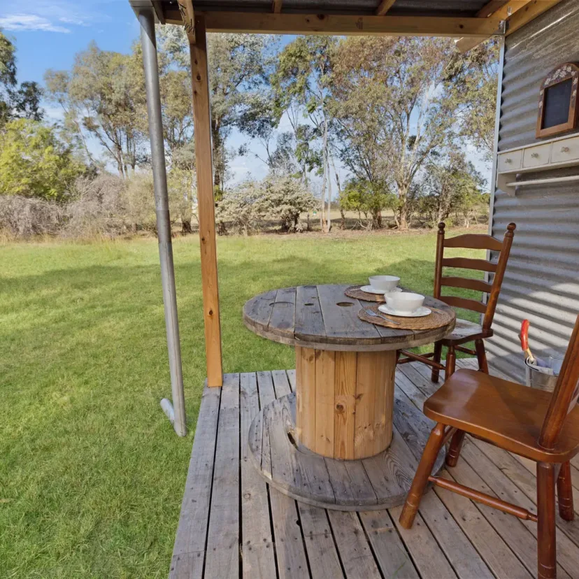 Interior and grounds at the Wanderlust glamping tent, Eagle Point Cottages