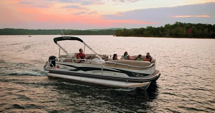 A pontoon boat out on the Gippsland Lakes with the family aboard